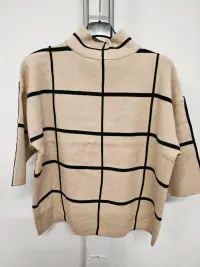 Unisexo de Tops del mayorista de ropa Tamia en Italia