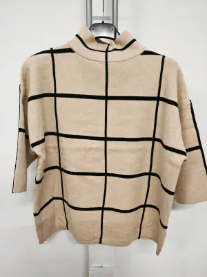 Unisexo de Tops del mayorista de ropa Tamia en Italia