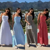 MulherVestidos de distribuidor de roupas C.Constantia em França